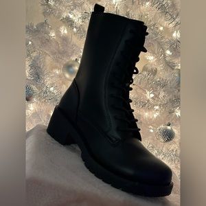Black laced up combat boots